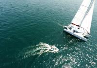 trimaran yacht with dinghy